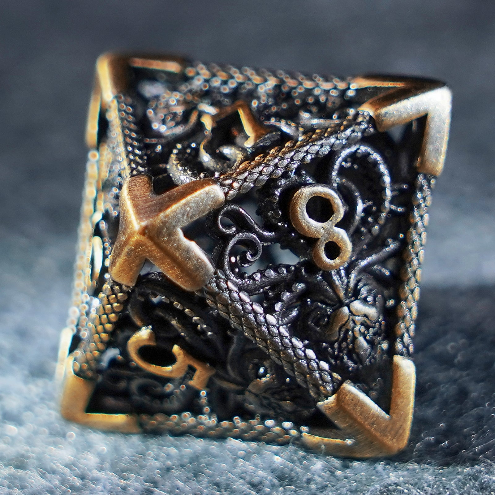 Cthulhu Gold Hollowed Metal Dice - DragonStone